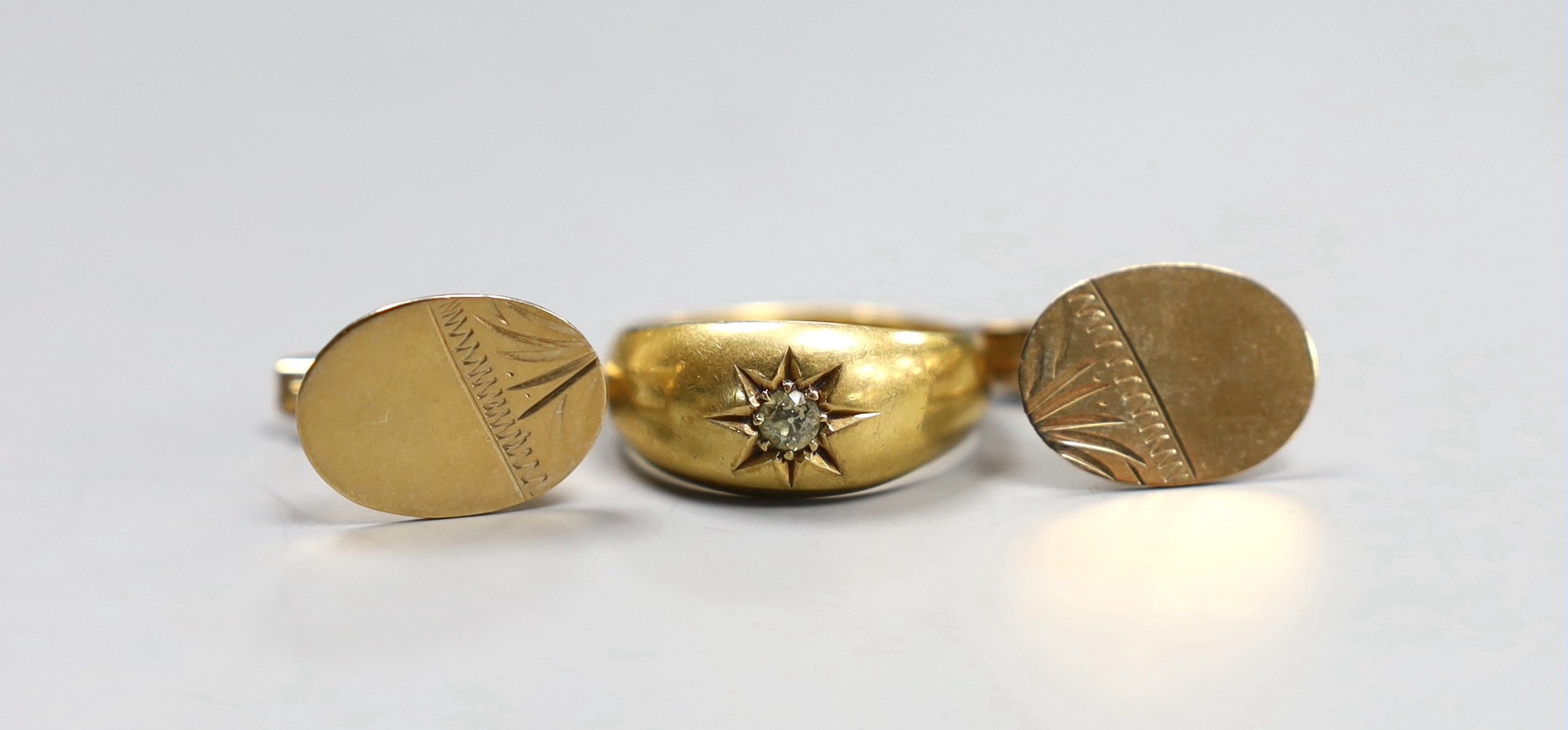 A pair of gold coloured metal cufflinks (tests as 9ct), 3 grams, and a diamond set 18ct gold ring, size N, gross 5.1 grams